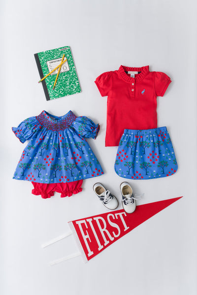 The Beaufort Bonnet Company Little Miss Prim & Proper Polo  Richmond Red with Barbados Blue Stork